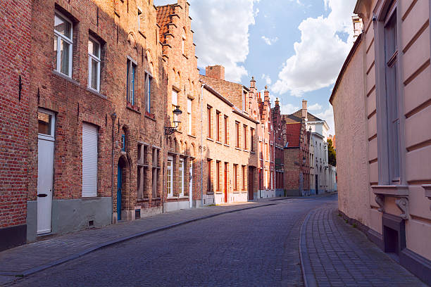 istock Cobblestone paved street during summer, Bruges 490609016