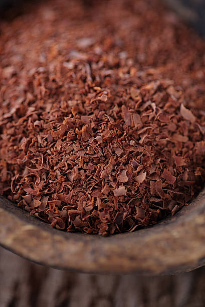 istock fine grated chocolate in old wooden spoon 490609059