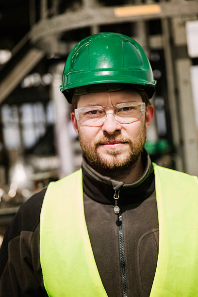 istock Confident manual worker in protective workwear at factory 490609202