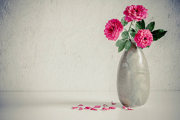 istock Still life with pink roses flower in ceramic vase 490609469