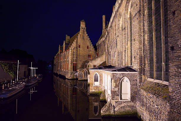 Sint-Janshospitaal view from river at night, Bruges, Belgium
