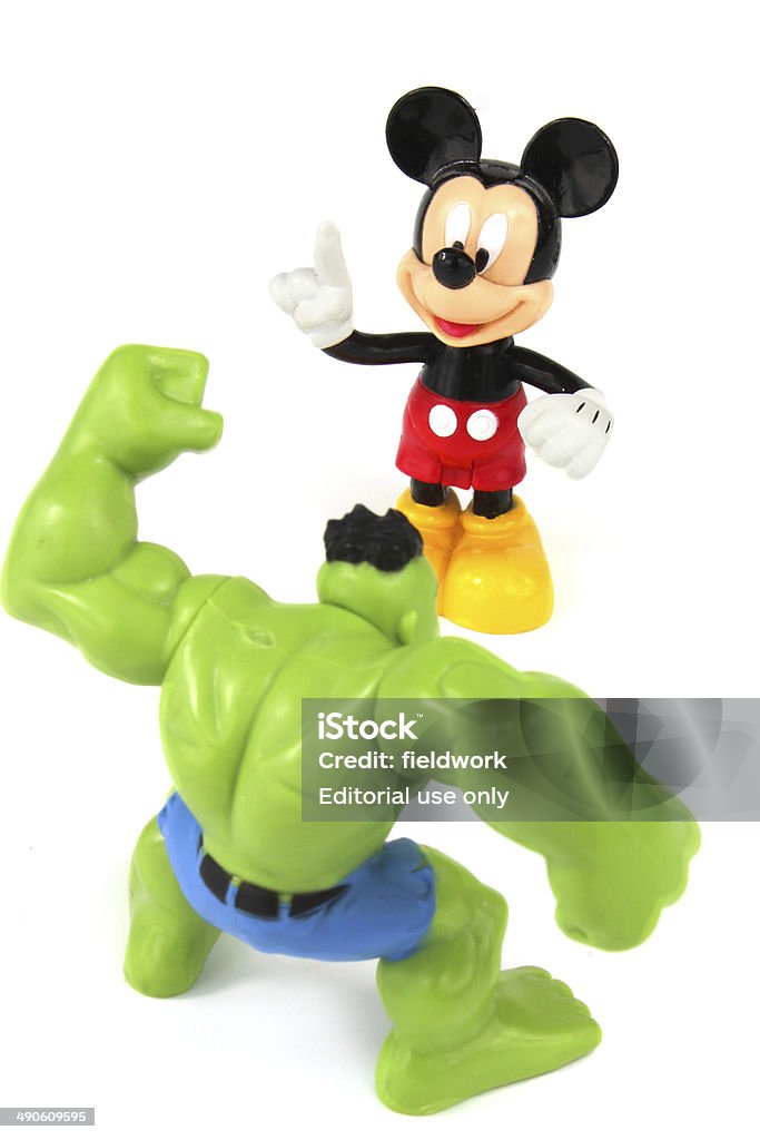 Mickey Mouse and The Hulk figurines Trowbridge, Wiltshire, UK - May 07, 2014: Photograph of Disney's Mickey Mouse and Marvel Comic's The Hulk. Mickey Mouse Stock Photo