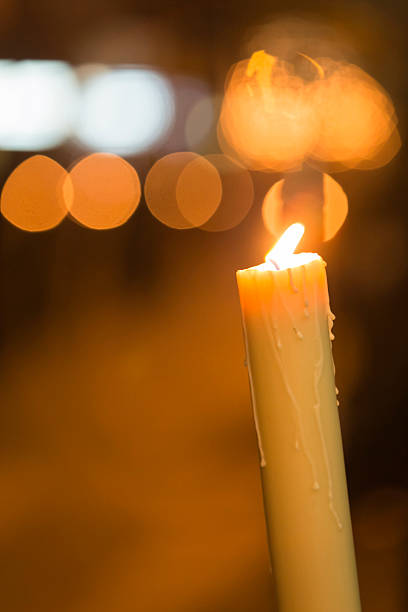istock Candle light with light bokeh in the background 490609911