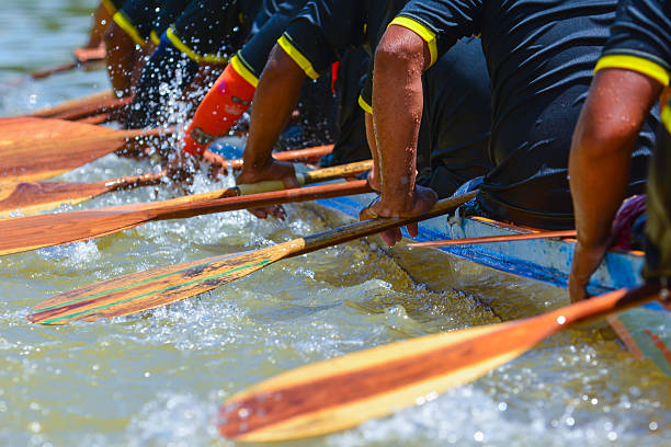 rowing team race stock photo