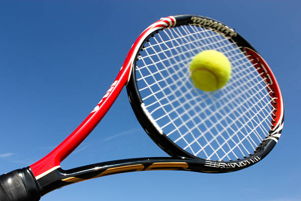 istock Tennis racket hitting the ball 490610735