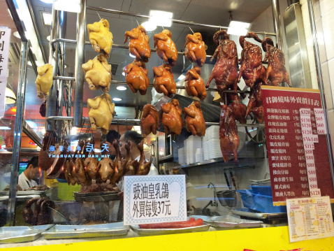 Hong Kong S.A.R. - May 4, 2014 : chinese butcher shop in Hong Kong, Causeway selling chicken, ducks and pork