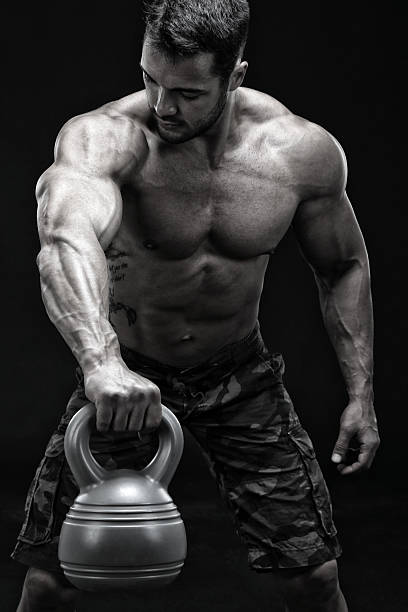 ケトルベルエクササイズ - chest sweat male pectoral muscle ストックフォトと画像