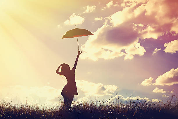 istock young women with umbrella 490611704