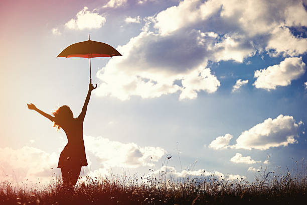 istock young women with umbrella 490611806