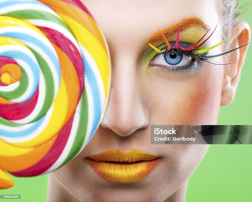 Colorful twisted lollipop, color fashion makeup Colorful twisted lollipop, colorful fashion makeup Multi Colored Stock Photo