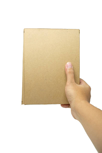 istock Hand holding Cardboard box isolated on white background 490612368