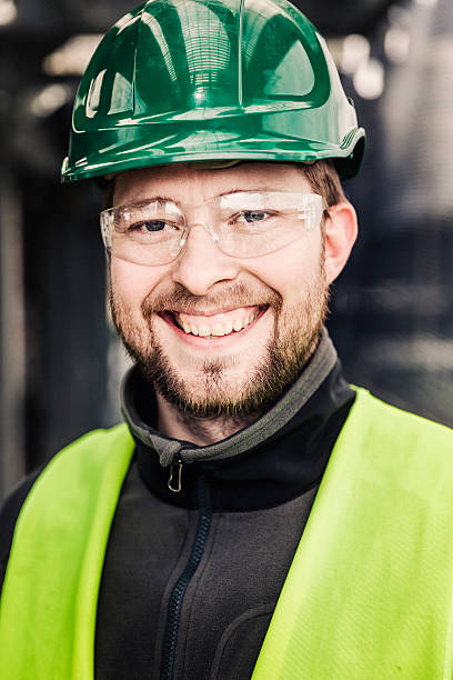 istock Happy manufacturing professional in protective wear 490612482