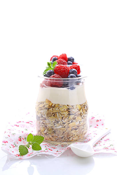 istock healthy breakfast - cereal with yogurt and berries 490613014