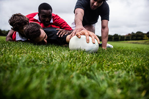 istock Rugby players tackling during game 490613154