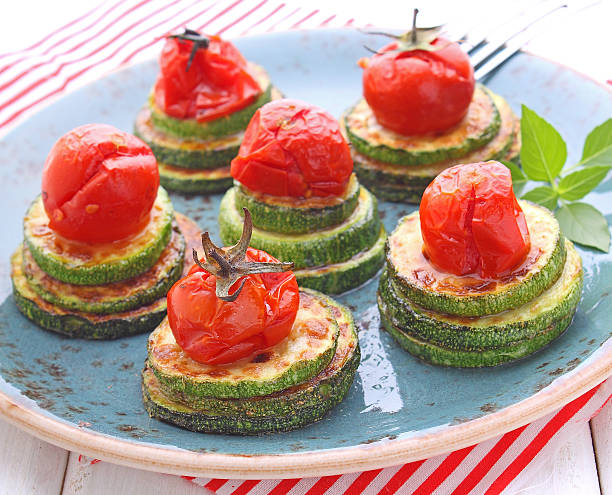 istock appetizer of fried zucchini and roasted cherry tomatoes 490613236