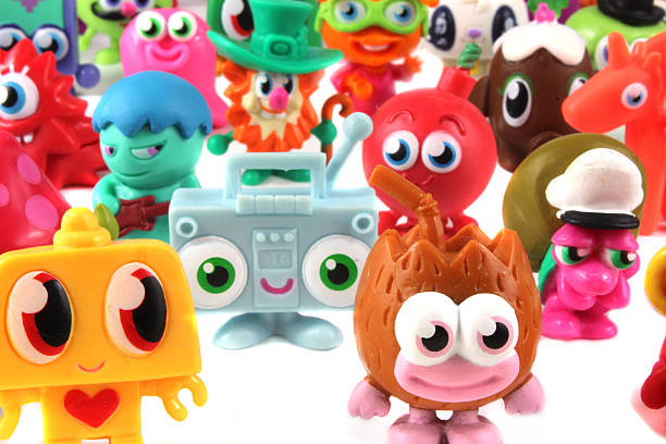 Trowbridge, Wiltshire, UK - May 07, 2014: Collection of 'moshlings'. Moshi Monsters (developed in 2007) is a website aimed at children aged 6–14 with over 80 million registered users worldwide. Following its online success, Moshi Monsters has expanded commercially with physical products, including toys such as these plastic figures which are hugely collectable.
