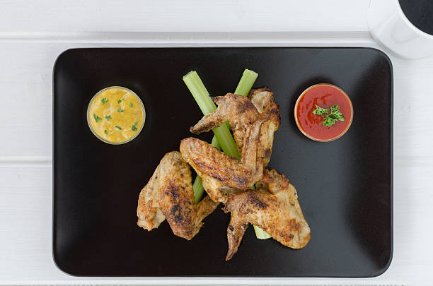 istock Chicken wings with dip and vegetables 490613907