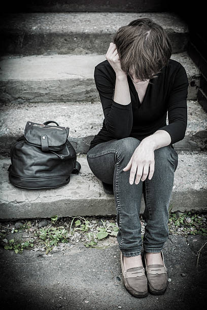 istock woman on stairs 490615238