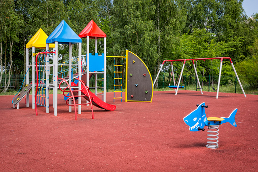 A colorful children's playground on a summer day