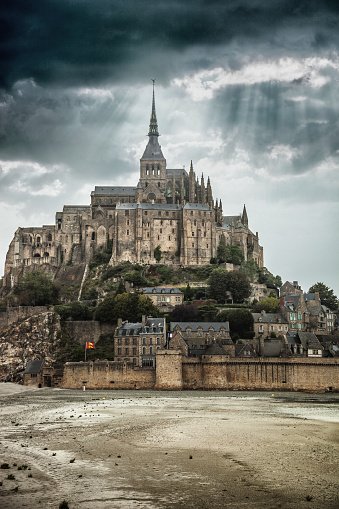 View to Le Mont Saint Michel in Normandy France under the storm.