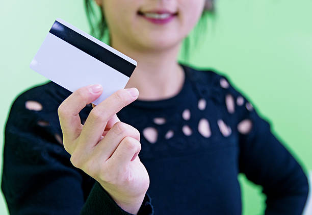 Woman holding a credit card
