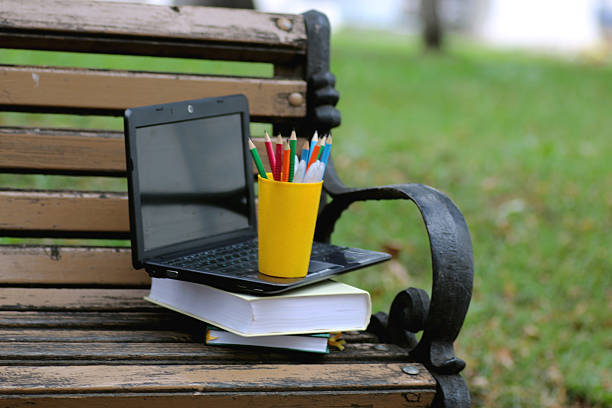 istock books on a bench in the school year 490617440