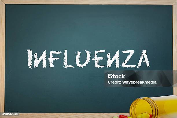 Influenza Against Spilled Pills Stock Photo - Download Image Now - 2015, Antibiotic, Blister