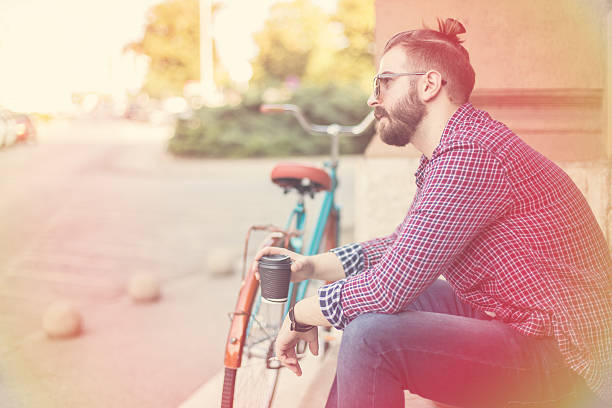istock hipster on a brake from a  bicycle ride 490619560