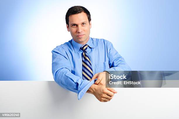 Businessman With Blank Sign Stock Photo - Download Image Now - Rolling, Businessman, Men