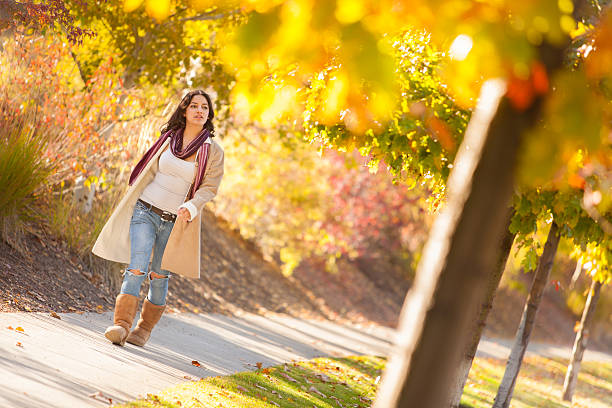 istock Attractive Woman Walking In The Park 490620876