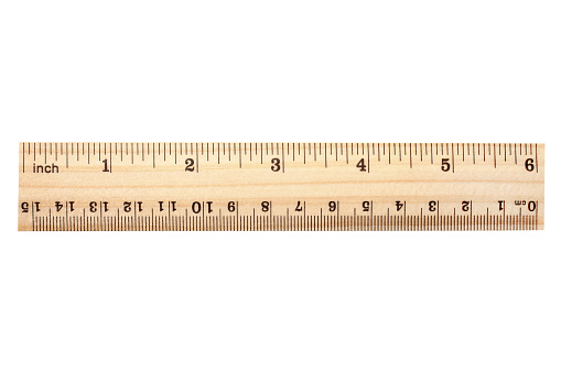 Wooden ruler isolated on white background