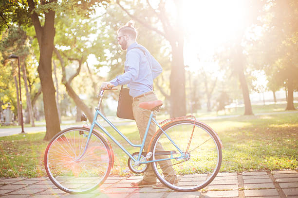istock off to work on a bike 490621232