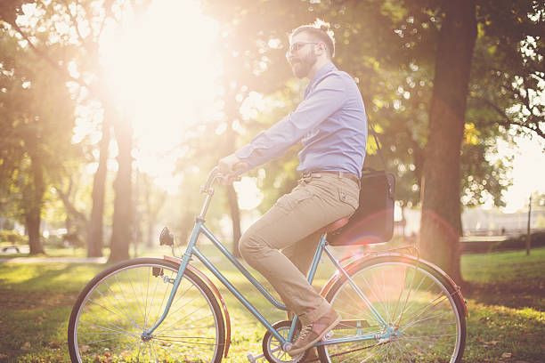 istock off to work on a bike 490621362