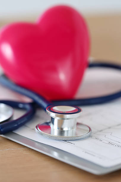 istock Medical stethoscope head and red toy heart 490632648