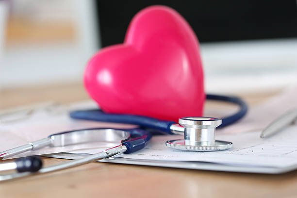 istock Medical stethoscope head and red toy heart 490633012
