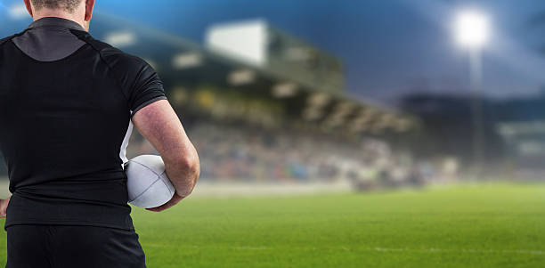 istock Composite image of rugby player holding the ball 490633038