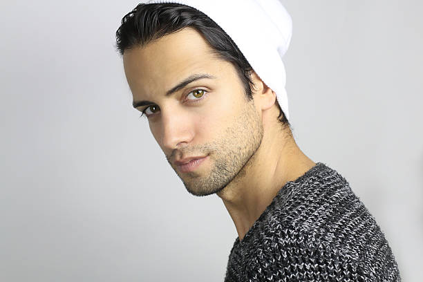 istock fashion winter - handsome man wearing an hat 490633360