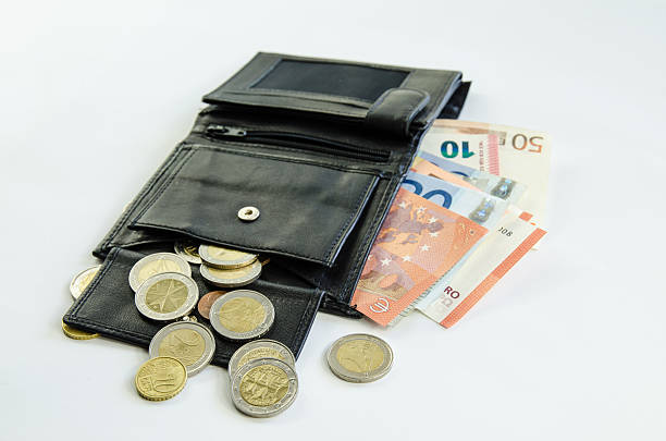 istock money in purse 490633726