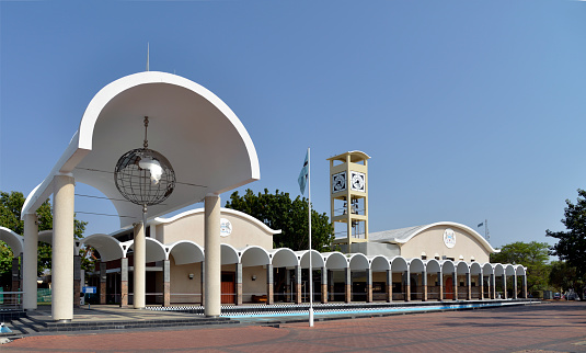 The Botswana Parliament building in Gabarone city. Taken on a clear warm day under a beautiful blue sky.Botswana is one of the most stable countries in Africa and Gabarone is the capital city. The picture on the white disc on the front of the building is the coat of arms. .No filters were used on this file.