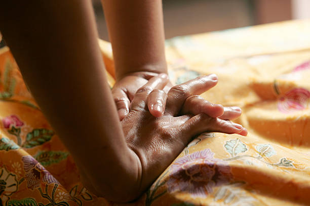 massage hands stock photo