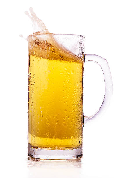 istock Beer splashing in glasses isolated 490638244