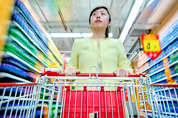 istock moving a shopping cart 490638368