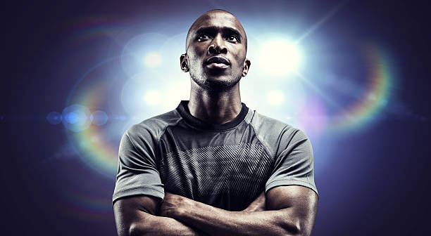 istock Composite image of thoughtful rugby player with arms crossed 490640438