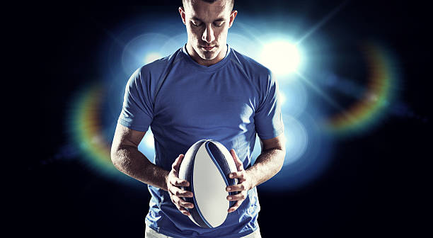 istock Composite image of rugby player holding ball 490640556