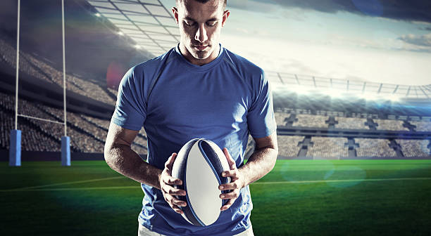 istock Composite image of rugby player holding ball 490641414
