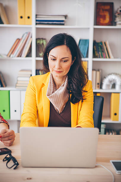 istock Woman working at modern office. 490641574