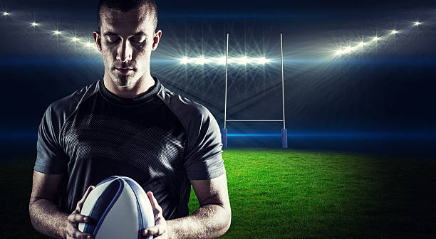 istock Composite image of thoughtful rugby player holding ball 490641586