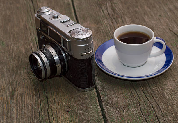 istock still life the old camera and coffee, on a table 490641856