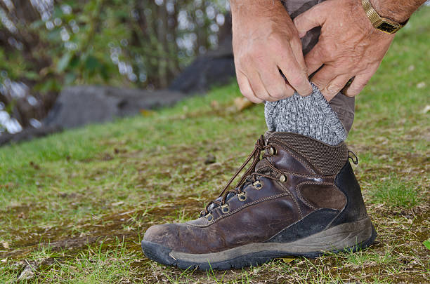 istock Protecting Against Ticks by Tucking Pants into Socks 490641864