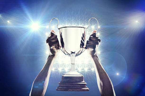 istock Composite image of rugby player with winners cup 490642710